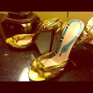 Gucci “Allie” Peep toe pump in Metallic Gold